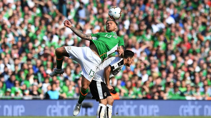 Hendrick wins a header ahead of Zlatko Junuzovic. Photo: Charles McQuillan/Getty Images