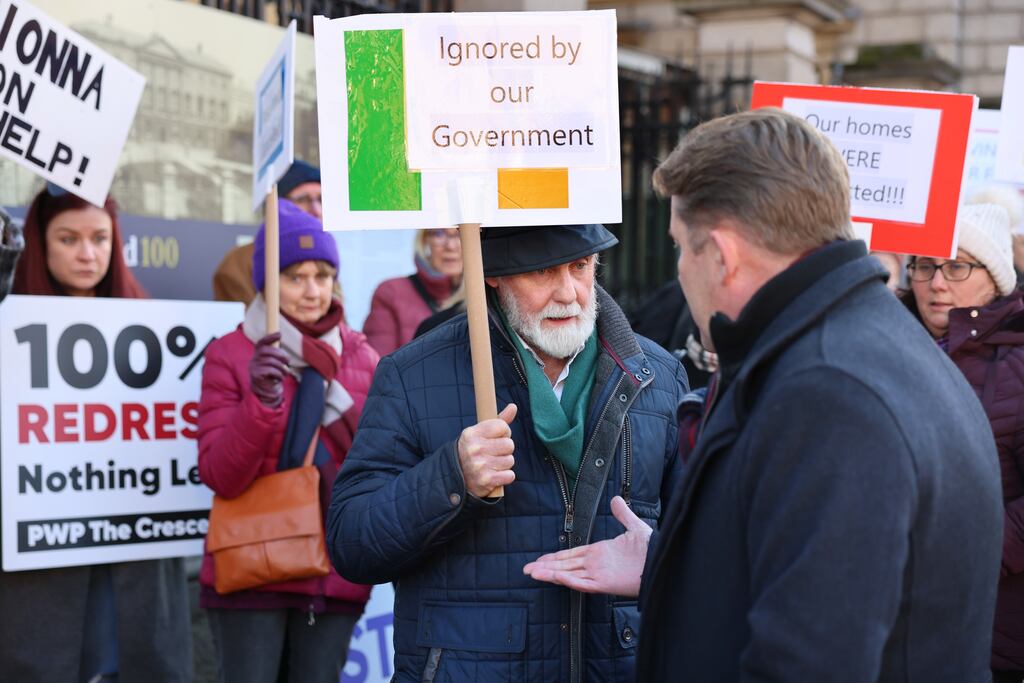 Minister for Housing Darragh O’Brien speaking to protesters from the Construction Defects Alliance in December. Photograph: Dara Mac Dónaill