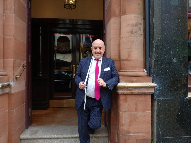 Tailor and retailer Louis Copeland outside his shop on Capel Street. Photograph: Ella Sloane