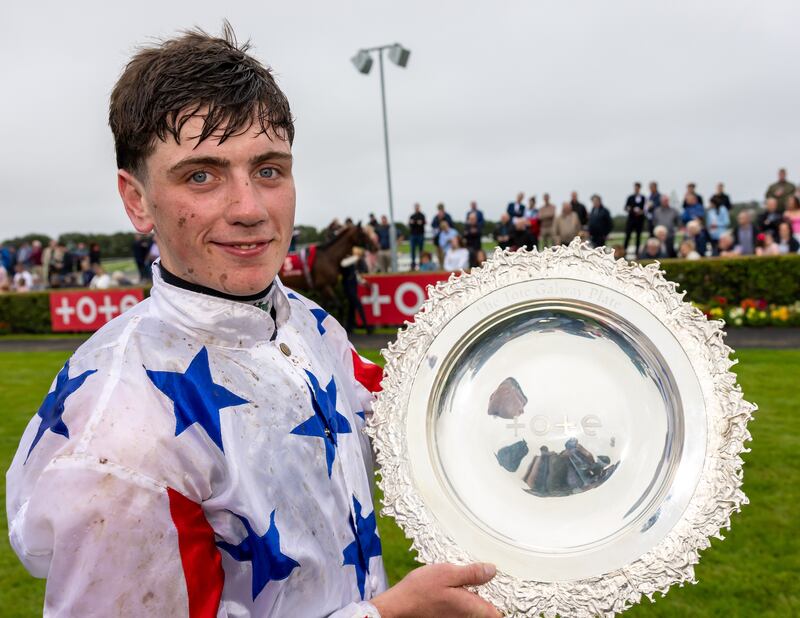 Jockey Danny Gilligan with the Galway Plate after his win on Western Fold. Photograph: Morgan Treacy/Inpho