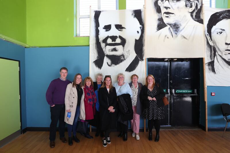 The family of John McKerr with his photograph. Photograph: Liam McBurney/PA Wire