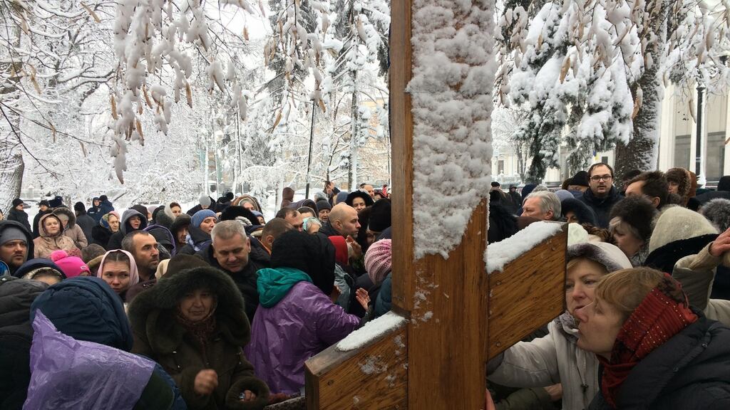 Ukrainians loyal to the Moscow Patriarchate of the Orthodox Church held prayers outside parliament in Kiev on Friday. Photograph: Dan McLaughlin