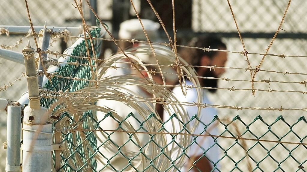 A file photo from 2010 shows US military guards moving a detainee to an undefined facility inside Camp Delta in the Detention Centre at Guantànamo Bay, Cuba. Photograph: Paul J Richards/AFP/Getty Images