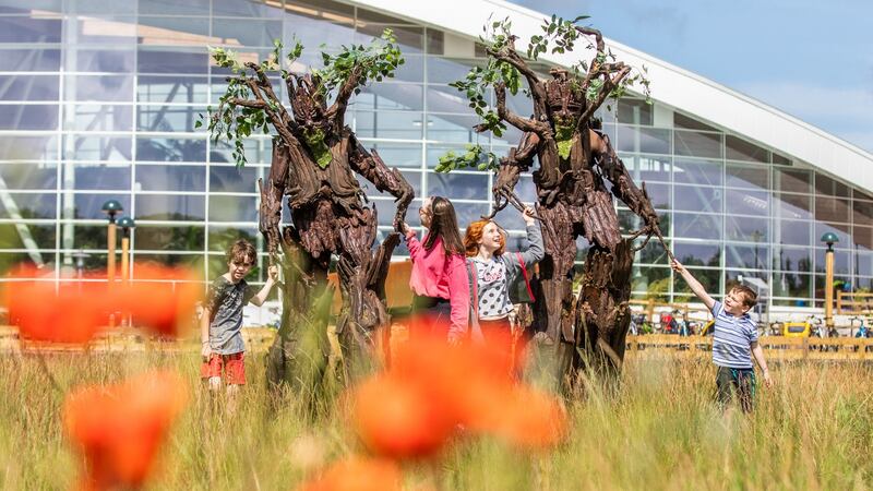 Ronan McGreevy’s children and their cousins: Leo (9), Annie (13), Rosamund (12), and Cillian (5) with entertainers Treenormous. Photograph: Naoise Culhane