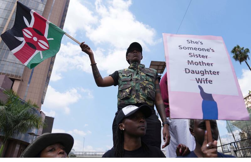 A protester holds a Kenyan flag during protests over the rising cases of femicide, in Nairobi. At least 500 women were killed in acts of femicide from January 2016 to December 2023, according to one media group. Photograph: Brian Inganga/AP
