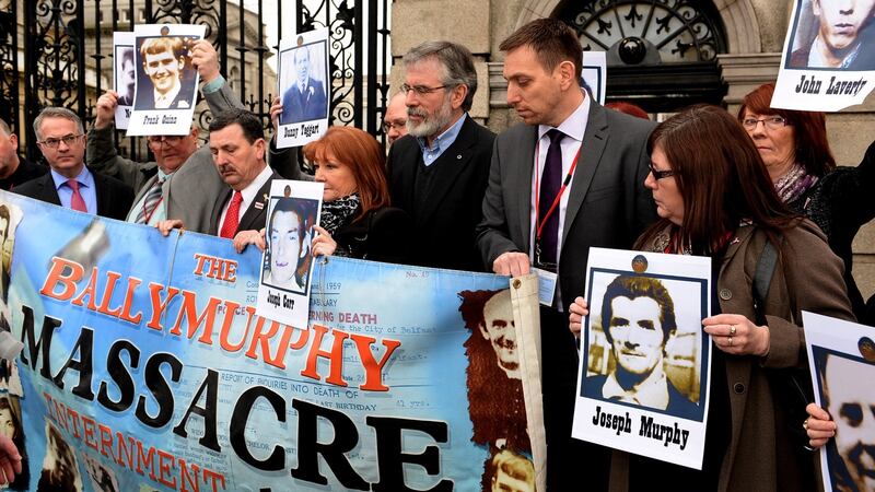Former Sinn Féin leader Gerry Adams with solicitor Pádraig Ó Muirigh and relatives of the Ballymurphy victims on January 30th, 2014. Photograph: Cyril Byrne