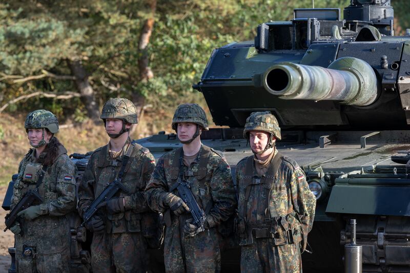The crew of a main battle tank Leopard 2 wait for German chancellor Olaf Scholz during his visit to the Bundeswehr training centre in Ostenholz on October 17th last. Photograph: David Hecker/Getty Images
