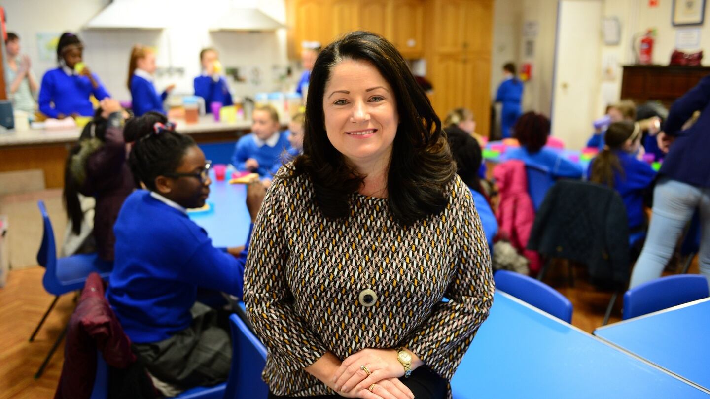 Janet Lynch, Principal, with students at St Eithne’s Girls National School, during the healthy breakfast club ‘Rise ‘n’ Shine’ and lunchbox initiative for pupils in Edenmore, Raheny, Dublin. Photograph: Dara Mac Dónaill