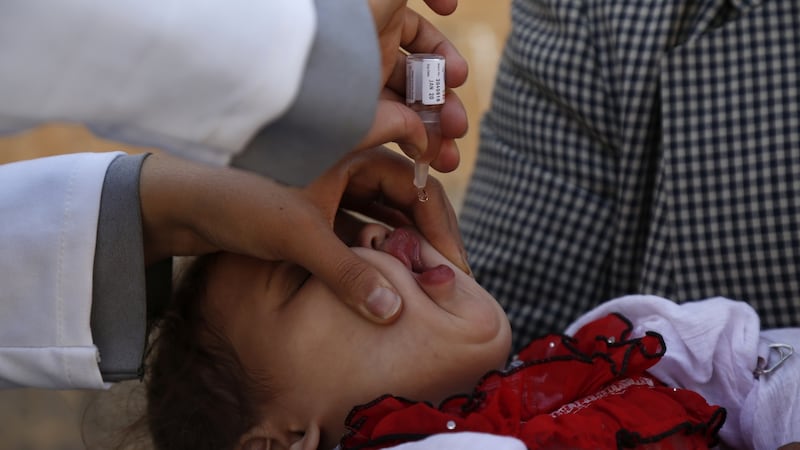 A child gets a vaccination against polio in the war-torn country of Yemen. Photograph: Mohammed Hamoud/Getty Images