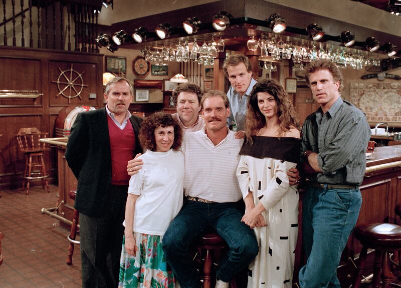 The cast of Cheers: John Ratzenberger, Rhea Perlman, George Wendt, Woody Harrelson, Kirstie Alley and Ted Danson with Boston Red Sox player Wade Boggs, centre, who appeared in an episode. Photograph: Ira Mark Gostin/AP