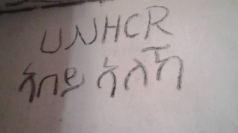 “Where is UNHCR?” written on the wall in the Souq al Khamis detention centre in Khoms.