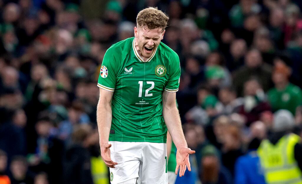 Ireland’s Nathan Collins reacts at the final whistle of the Euro 2024 qualifier against France. Photograph: Morgan Treacy/Inpho
