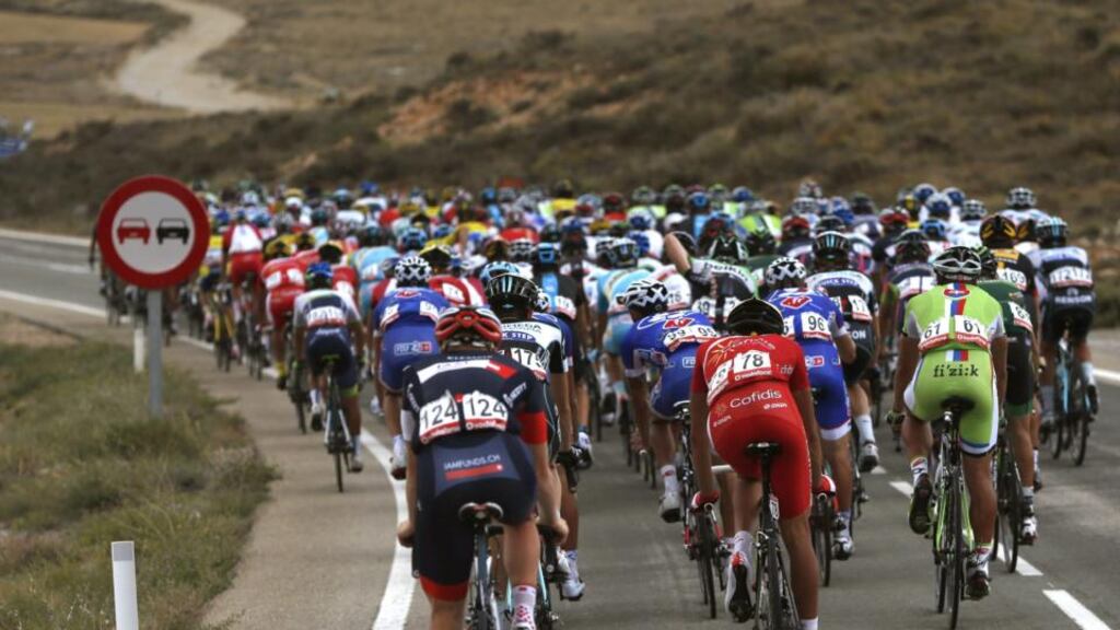 The pack in action during the ninth stage of the VVuelta Ciclista cycling race, of 185km between Carboneras de Guadazaon and Aramon Valdelinares. Photograph: Javier Lizon/EPA