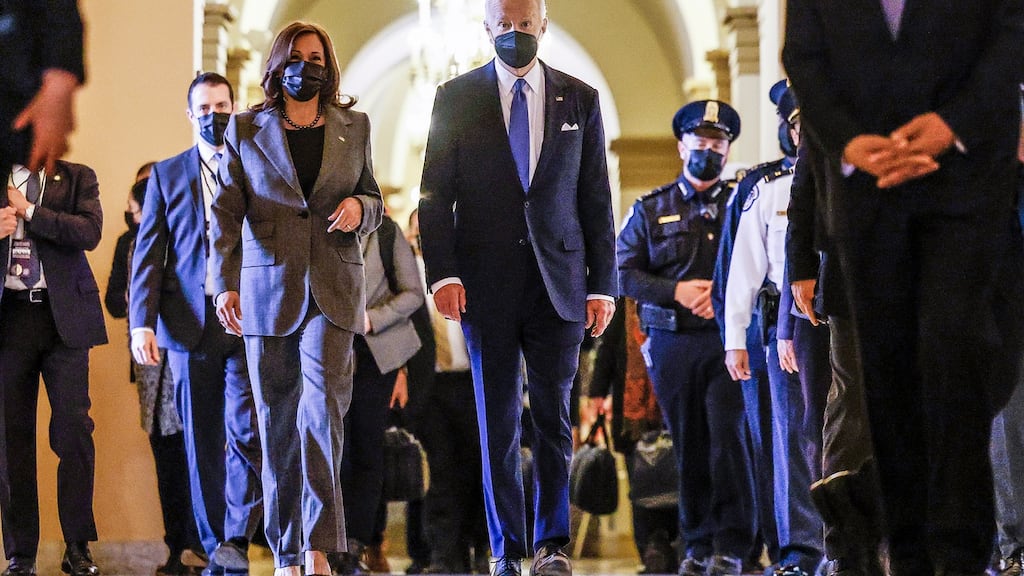 US president Joe Biden and vice-president Kamala Harris departing Capitol Hill after delivering speeches to mark the first anniversary of the attack on the US Capitol by supporters of former president Donald Trump. Photograph: EPA/Evelyn Hockstein/pool