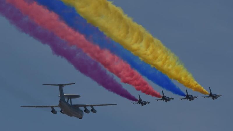 A Chinese People’s Liberation Army Air Force KJ-2000 (L) flies in formation with Chengdu J-10 multirole fighter aircraft. Photograph: AFP/Getty Images
