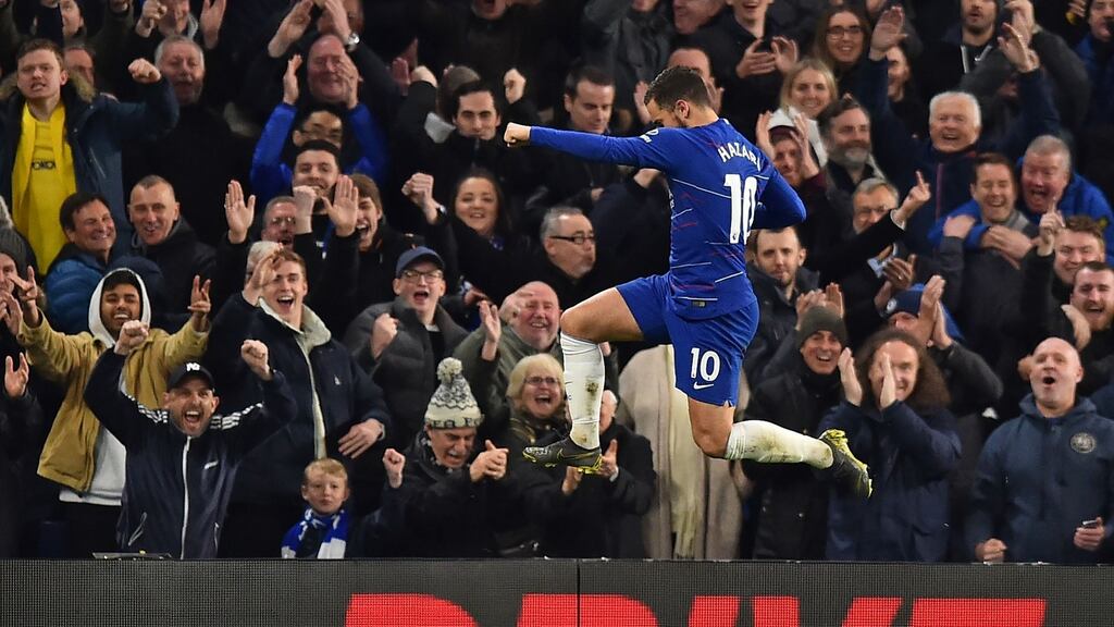 Chelsea’s Eden Hazard celebrates after scoring their second goal during the Premier League win over Brighton. Photo: Glyn Kirk/Getty Images