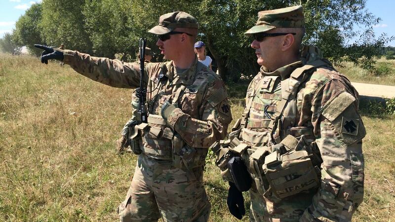 Dave Jordan (right), commander of the 45th infantry brigade of the Oklahoma national guard that is now in western Ukraine training the country’s soldiers, oversees drills with Lieut Travis Shuck. Photograph: Daniel McLaughlin
