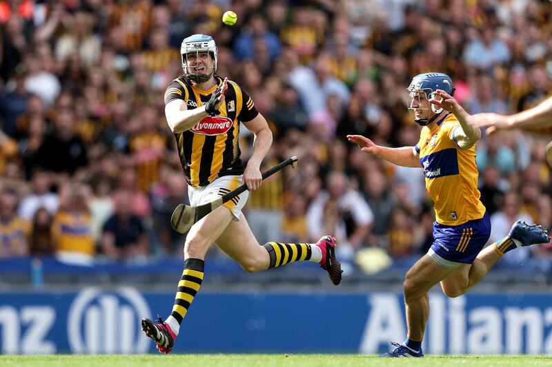 Kilkenny's TJ Reid hand passes the ball to Eoin Cody to score a goal against Clare in the All-Ireland semi-final at Croke Park. Photograph: Laszlo Geczo/Inpho