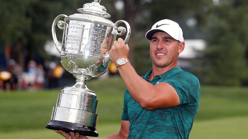Brooks Koepka holds the Wanamaker Trophy after winning the PGA Championship golf tournament at Bellerive Country Club in St Louis, Missouri last Sunday. Photograph: Jeff Roberson/AP