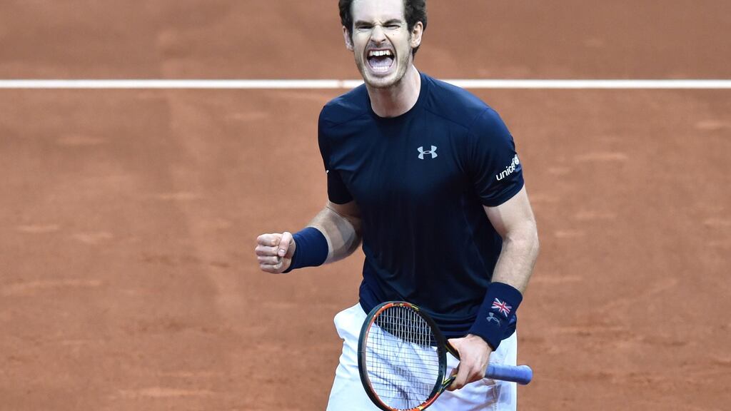 Andy Murray celebrates after beating Belgium’s Ruben Bemelmans on the first day of the Davis Cup final. Photograph: Getty Images