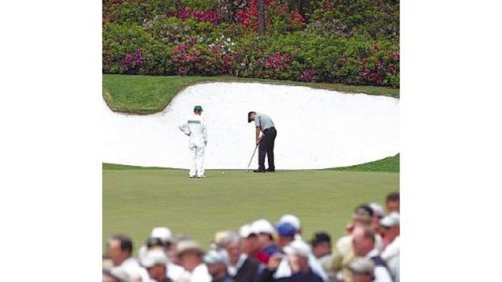 Padraig Harrington putts on the 13th green during yesterday?s practice for the Masters in Augusta. The Dubliner is among those generally regarded as having the mental and physical stamina to go the distance on what is expected to be a gruelling weekend.