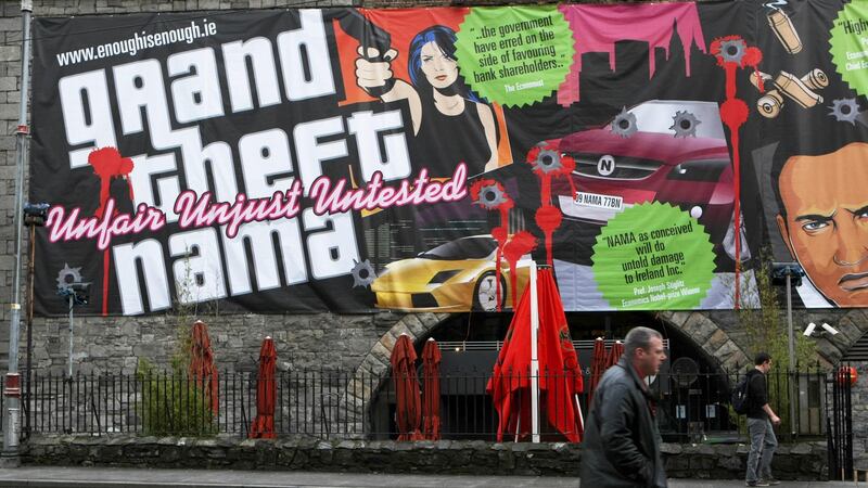 A billboard comparing the National Asset Management Agency (Nama) to the computer game Grand Theft Auto on the side of a building in Dublin in November 2009. Photograph: Julien Behal/PA