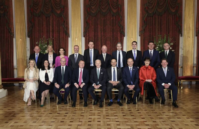 US president Joe Biden in an official group photo with members of the Government at Dublin Castle on Thursday. Photographer: Julien Behal/Bloomberg
