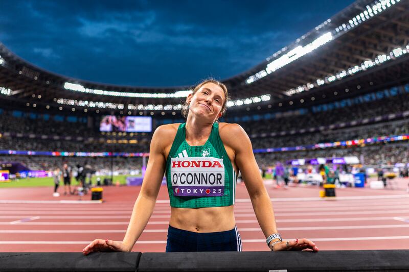Ireland’s Kate O’Connor chats with her coaching team between jumps. Photograph: Inpho/Morgan Treacy