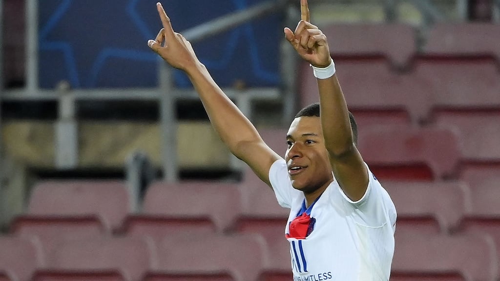 Kylian Mbappe celebrates after scoring PSG’s fourth against Barcelona. Photograph: Lluis Gene/Getty/AFP