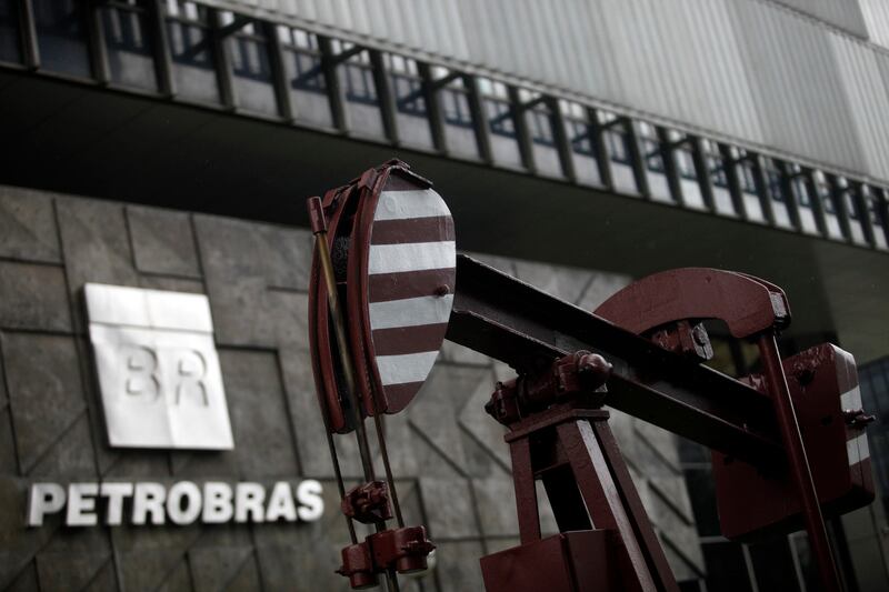 A replica of an old oil pump stands outside the headquarters of Petroleo Brasileiro SA (Petrobras) in Rio. Brazil’s state-controlled oil giant is central to the corruption scandal. Photograph: Dado Galdieri/Bloomberg
