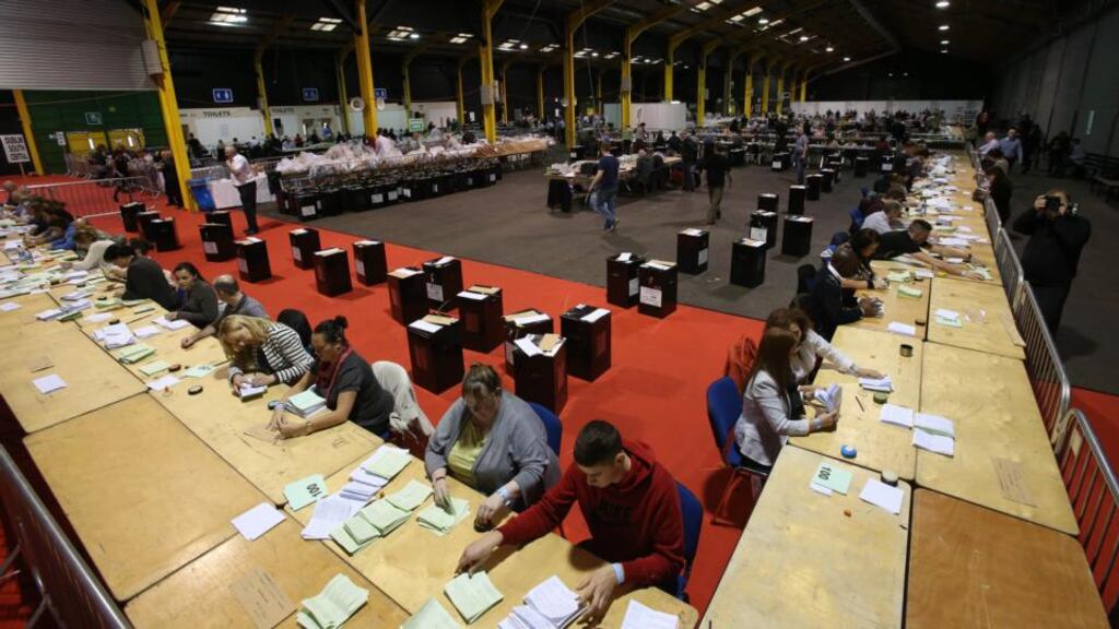 Counting of votes in the referendums on the future of the Seanad and the establishment of a new Court of Appeal under way at the RDS.  Photograph: Niall Carson/PA Wire
