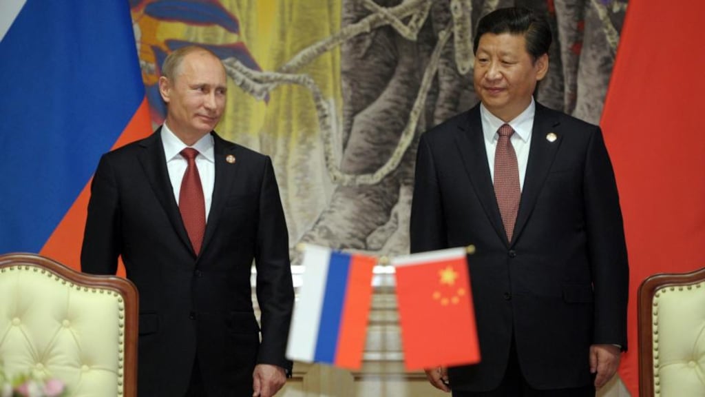Russia’s Vladimir Putin and China’s Xi Jinping at a signing ceremony for a long-awaited agreement for Gazprom to supply gas to China. Photograph: Alexei Druzhinin/Reuters