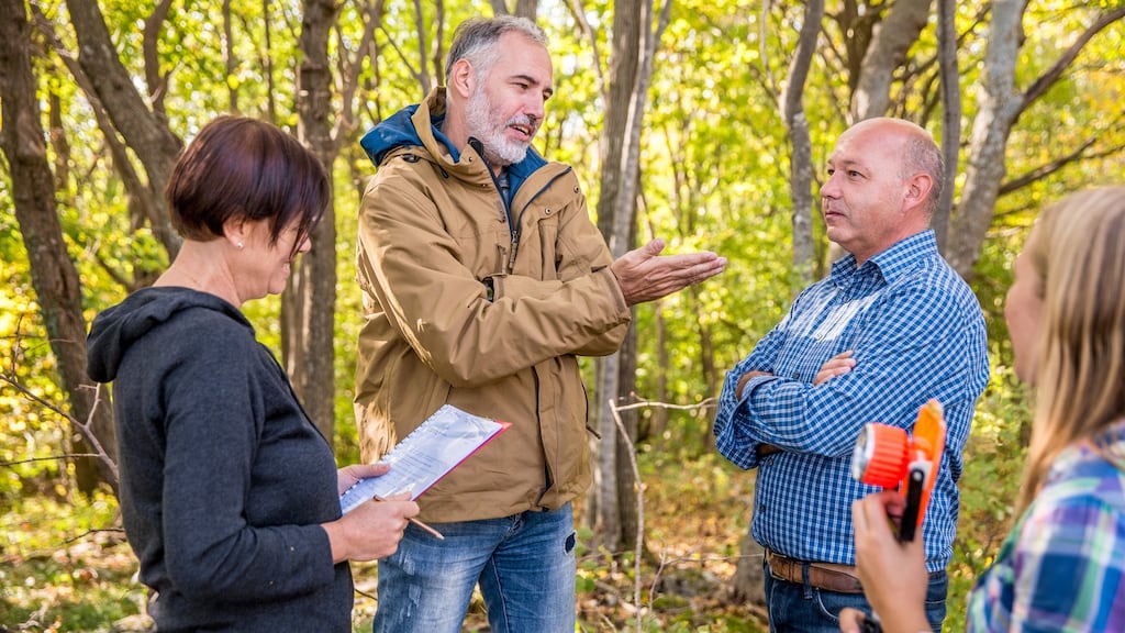 A chartered geomatics surveyor can resolve issues of land ownership between neighbouring properties. Photograph: Getty Images
