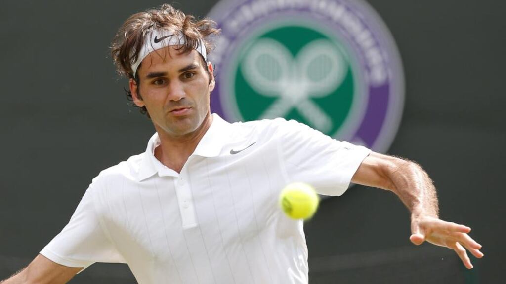 Roger Federer has beaten Paolo Lorenzi of Italy during their first round match at Wimbledon. Photograph: Valdran Xhemaj