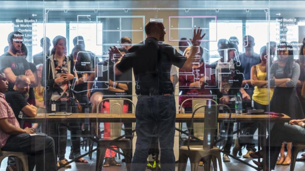 Phil Gilbert (centre), general manager IBM Design, at an IBM Design studio gathering