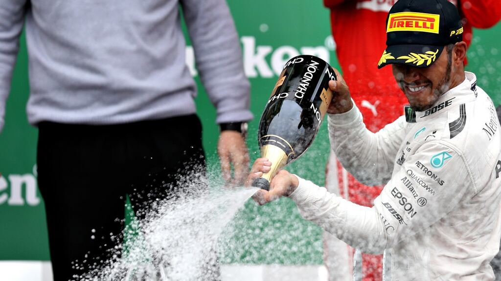 Lewis Hamilton of Mercedes celebrates winning the Canadian Grand Prix at Circuit Gilles Villeneuve in Montreal. Photograph: Getty Images