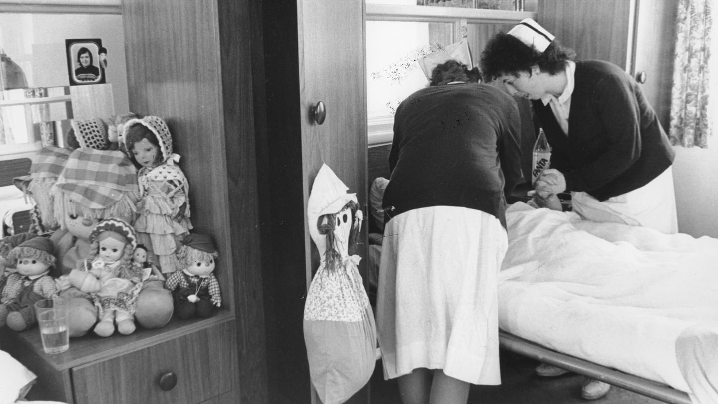 Views of St Ita’s Hospital, Portrane, in 1985: nurses lend a hand in the assessment ward. Photograph: Matt Kavanagh