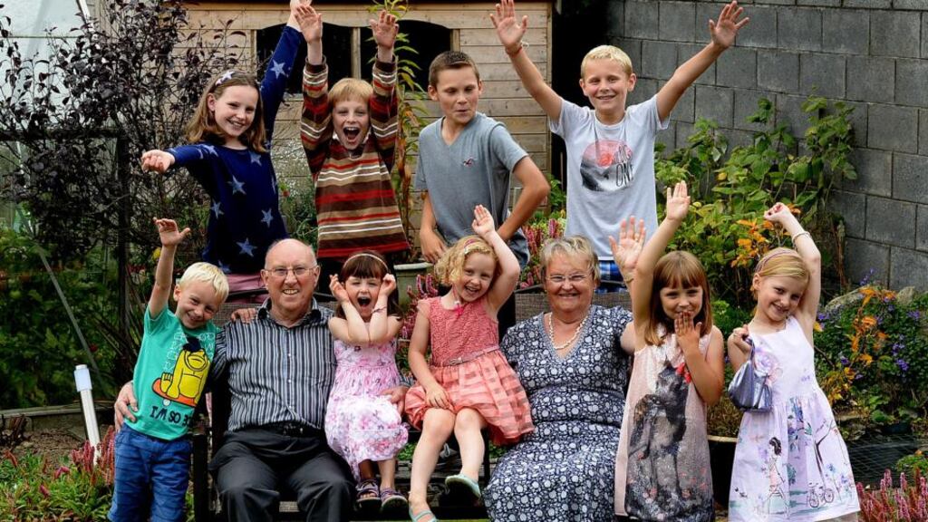 Donald and Jane Maxwell at their Cabinteely home with their grandchildren (front, from left) Charlie Hilliard, Clara Maxwell, Lucy Hilliard, Alison Plunkett and Lisa Maxwell; (back row, from left) Tanya Plunkett, David Maxwell, Daniel Plunkett and Ben Hilliard. Photograph: Cyril Byrne