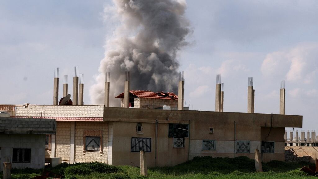 Smoke rises after an air strike on rebel-held Daraa al-Balad last Friday. Activists say regime forces backed by Russian warplanes have increased attacks. Photograph: Alaa Al-Faqir/Reuters