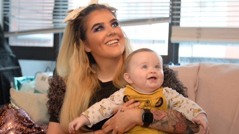 Jasmine Frances Mooney, with her baby Elijah Robert   at home in Ashtown, Dublin. Photograph: Dara Mac Dónaill
