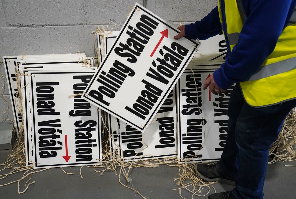 Polling station signs in a warehouse in Dublin in preparation for delivery ahead of today's voting. Photograph: Brian Lawless/PA
