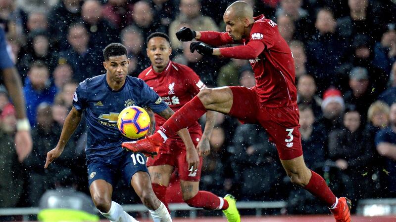 Fabinho of Liverpool against Manchester United’s Marcus Rashford. Photograph: Peter Powell/EPA