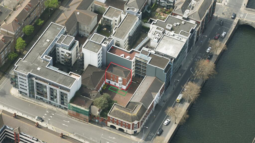 An aerial view of Usher’s Court with Block C and its parking outlined in red and green respectively.