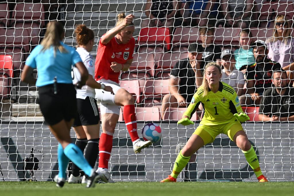 Austria defender Katharina Schiechtl scores the opening goal past Northern Ireland goalkeeper Jackie Burns during the Uefa Women's Euro 2022 Group A match at St Mary's Stadium in Southampton. Photograph: Justin Tallis/AFP via Getty Images