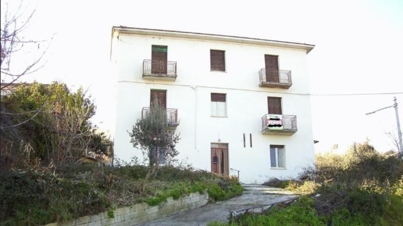 This house is surrounded by a 850sq m garden with outbuildings and a private drive.