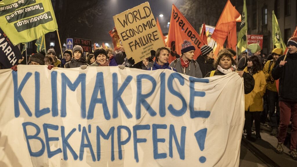 Protesters march during a demonstration against the World Economic Forum in Davos, in the streets of Zurich, Switzerland, on Wednesday. Photograph: Ennio Leanza/EPA