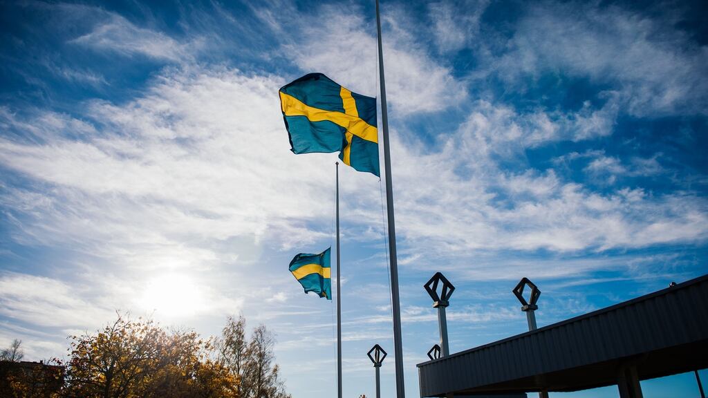 The Swedish flag flies at half mast as a mark of respect to those killed by Anton Lundin-Pettersson on Thursday. On Saturday police said arson was suspeced as the reason for a fire at a summer camp near Stockholm.