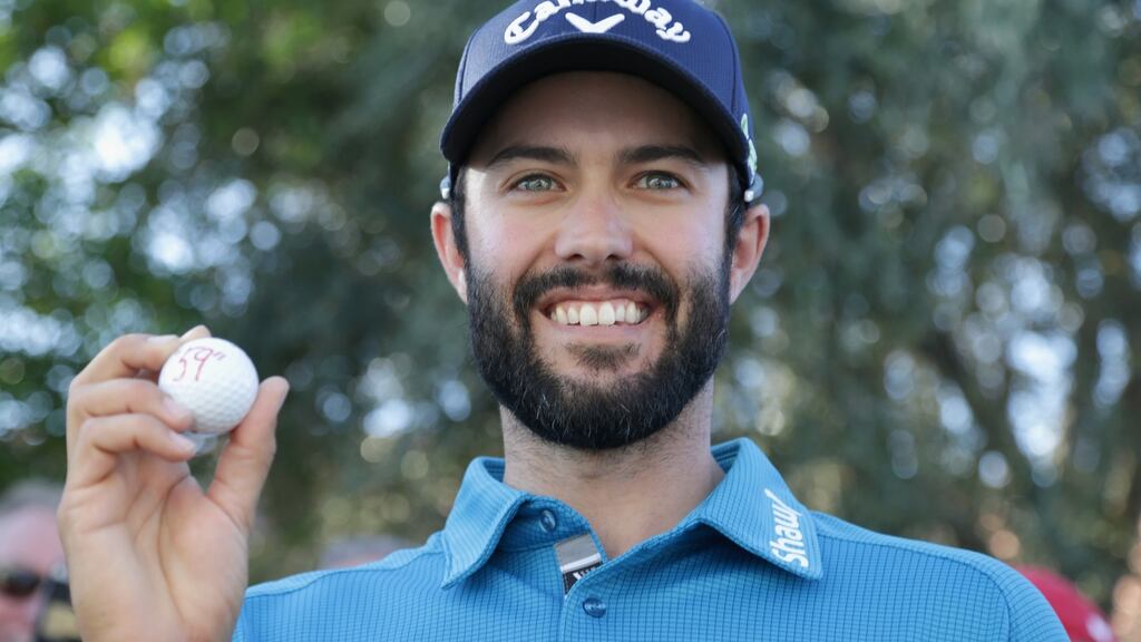 Adam Hadwin of Canada poses with his ball after shooting a 59 during the third round of the CareerBuilder Challenge at La Quinta Country Club, California. Photo: Jeff Gross/Getty Images