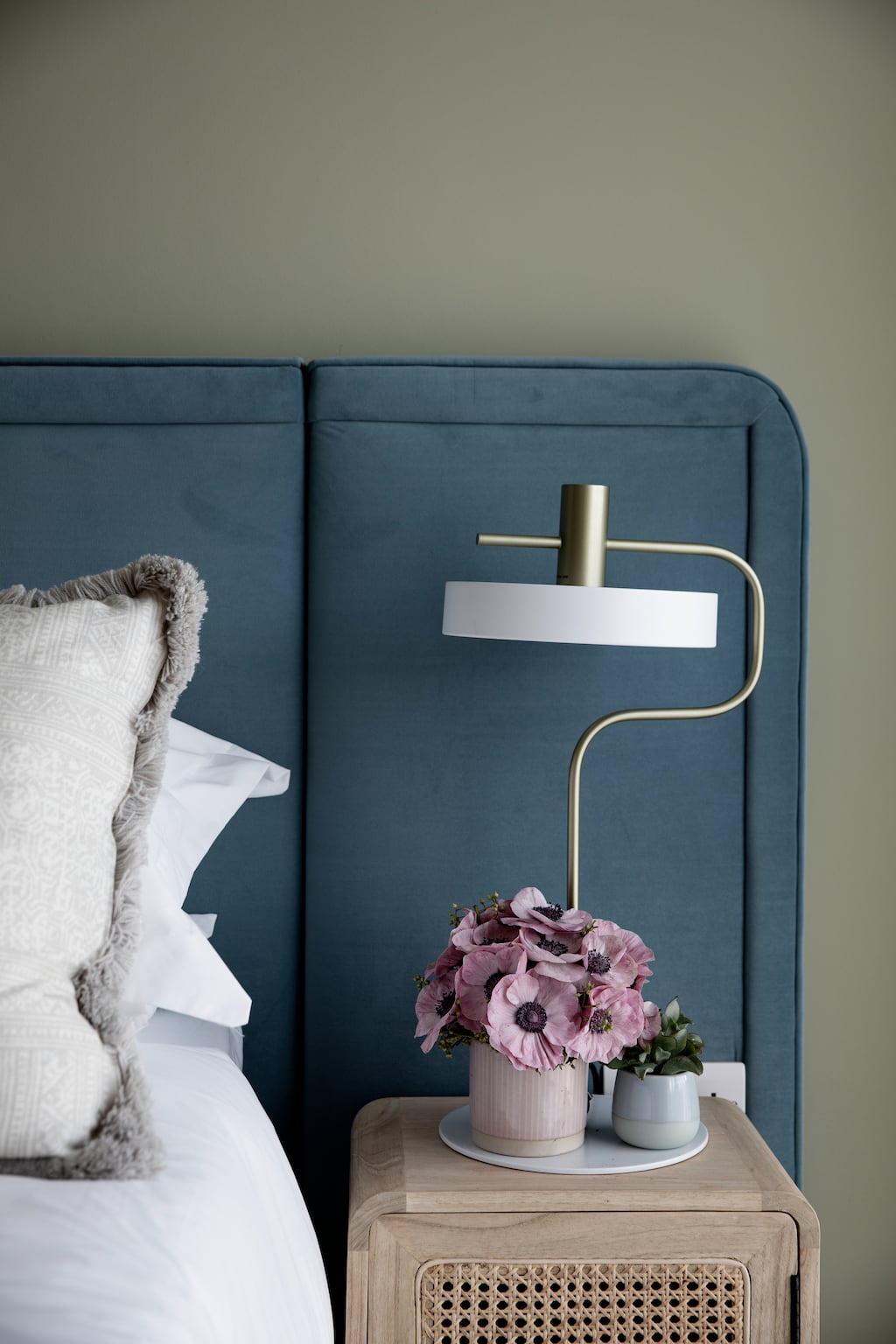 Bedside light in bedroom designed by Optimise Design