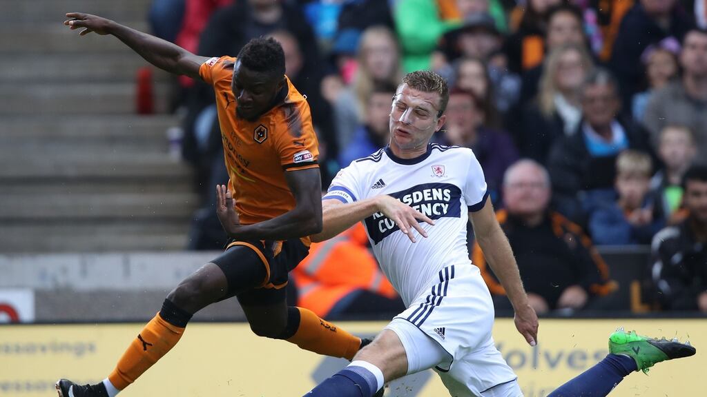 Middlesbrough’s Ben Gibson (right) and Wolverhampton Wanderers’ Bright Enobakhare battle for the ball during the Sky Bet Championship match at Molineux. Photograph: Nick Potts/PA Wire